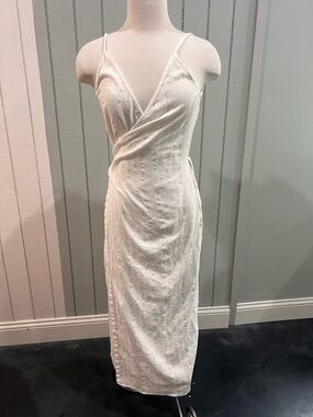 Sleeveless White Wrap-Front Midi Dress